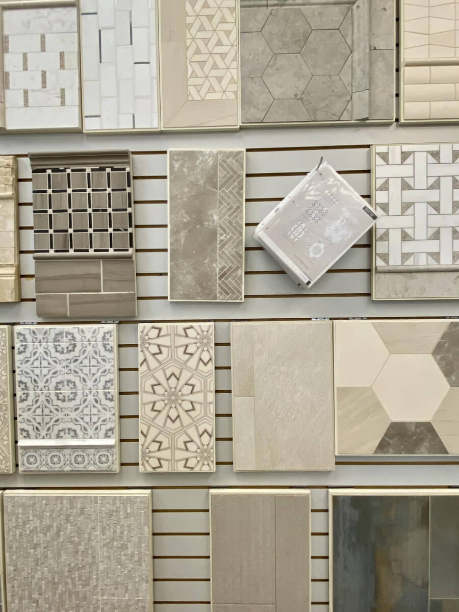 Premium tile samples display featuring ceramic, porcelain, and patterned tiles for kitchen and bathroom design